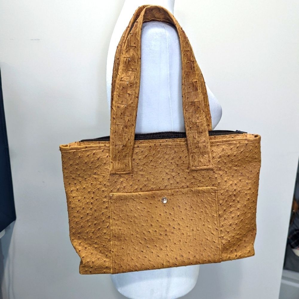 Beautiful vintage hand made bag with wood bottom finish